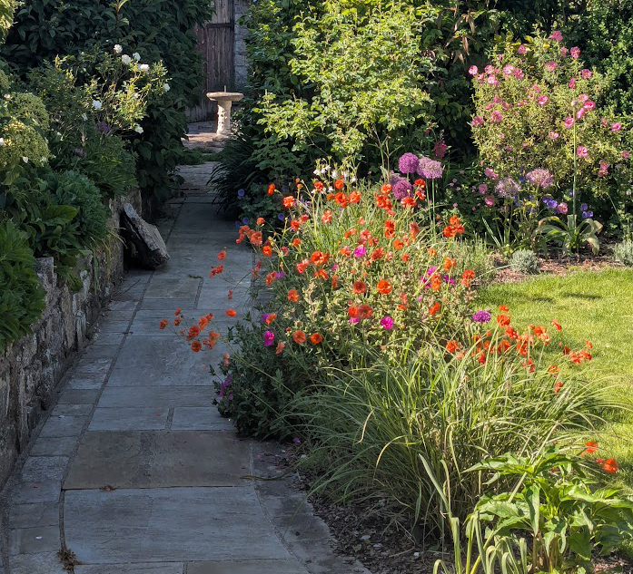 Rear Lawned Garden of a Stone House in South Wales
